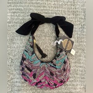 Elegant Beaded Shoulder Bag with Black Bow